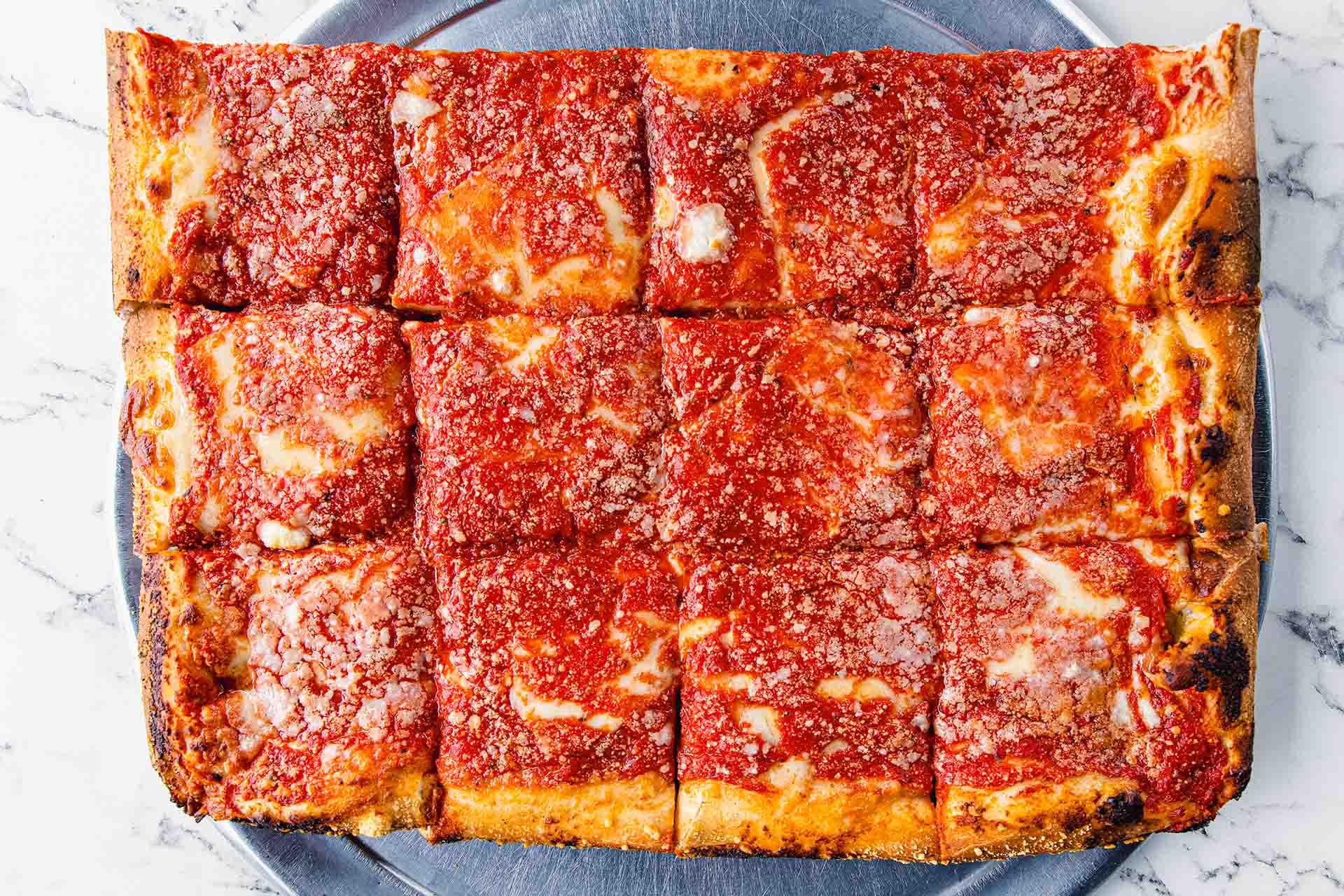 L&B Spumoni Gardens iconic Sicilian square pizza, fresh from the oven