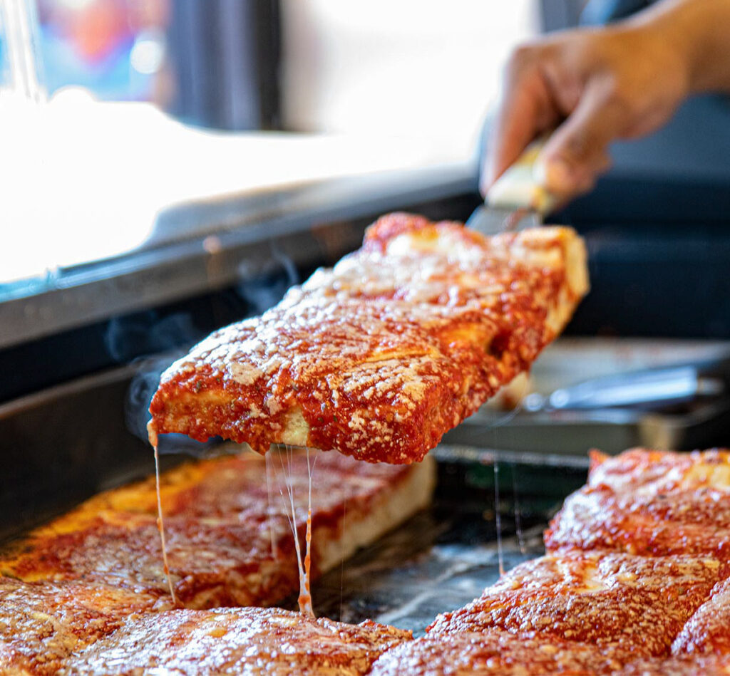 L&B Spumoni Gardens square Sicilian pizza slices